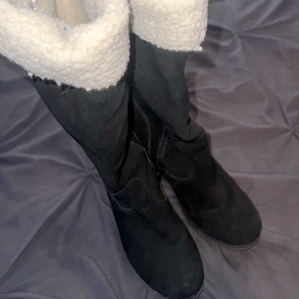 Black suede wedge boots.